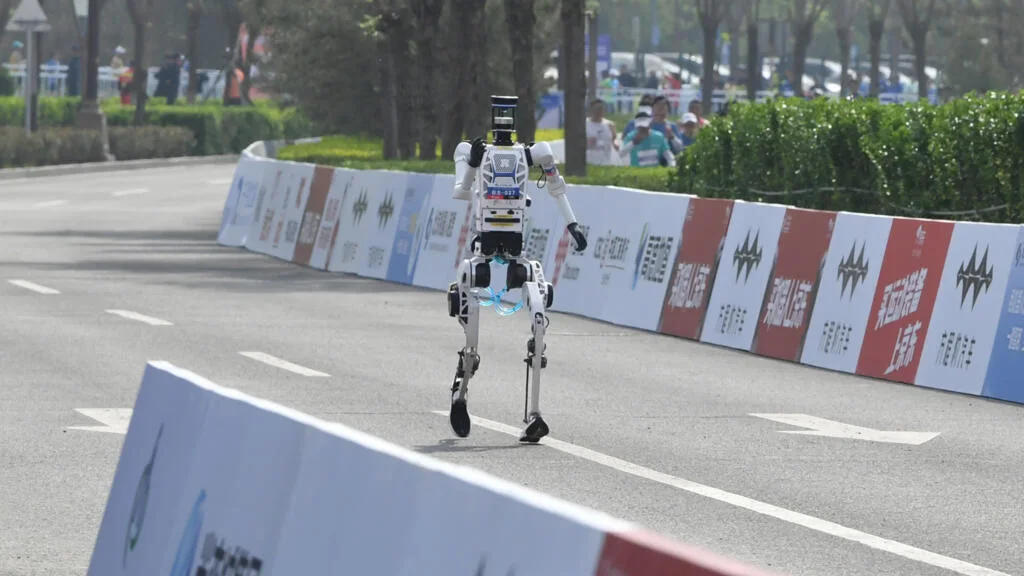 Bipedal Endurance Benchmarks: From 160 Minutes to a 50-Minute Half-Marathon